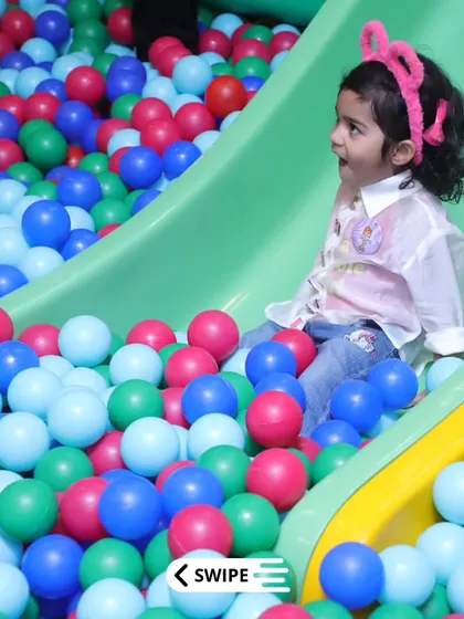 The look of surprise and delight as a child lands in a sea of colorful balls. Our ball pit is deep enough for fun but safe for all ages.