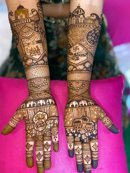 Another view of the auspicious symbols mehandi, showing the incredible detail and the dark, rich stain.