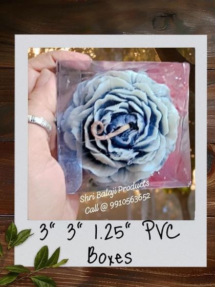 A 3x3x1.25 inch shallow PVC box, shown here packaging a flat, decorative rose candle. I have boxes for all shapes and sizes.