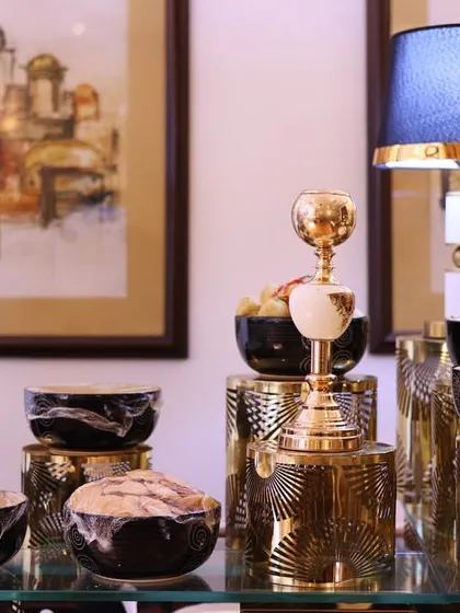 A section of our modern chaat station, where traditional flavors meet contemporary design. The setup features artistic decor, framed paintings, and stylish lamps to create a sophisticated ambiance.