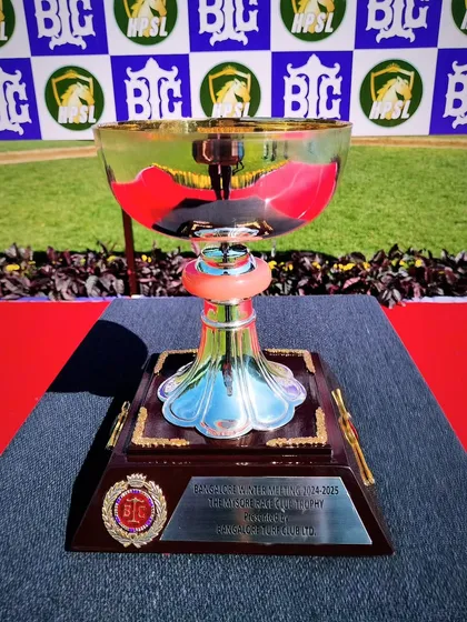The Mysore Race Club Cup, a classic silver bowl design.