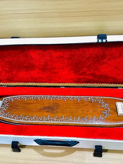The Sri Saraswati Tanpura, also known as a box tanpura or handy tanpura. It is very compact and comes in its own case, making it the perfect travel companion for any musician.