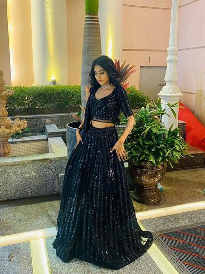 The full look of the black sequin rental lehenga. It’s a simple, elegant, and high-impact outfit that never goes out of style.