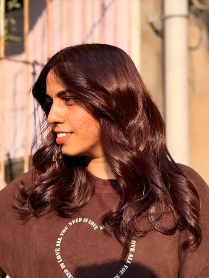 The 'Brownie' color looks stunning in the sunlight, showing off its warm, reddish-brown hues.