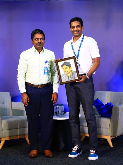 It was a proud moment to present my finished color pencil portrait to the man himself, Pullela Gopichand. Seeing a client's reaction to their portrait is the best part of my job.