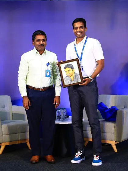 It was a proud moment to present my finished color pencil portrait to the man himself, Pullela Gopichand. Seeing a client's reaction to their portrait is the best part of my job.