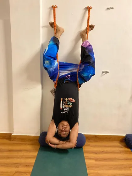Just let go. My student Tarun tries an inversion using the wall ropes for the first time, allowing his spine to decompress completely.