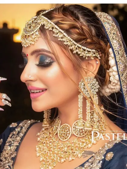 This look shows the beautiful variety in my collection. The unique, oversized choker and matching long earrings create a bold and fashionable statement, perfect for a sangeet or mehendi function.