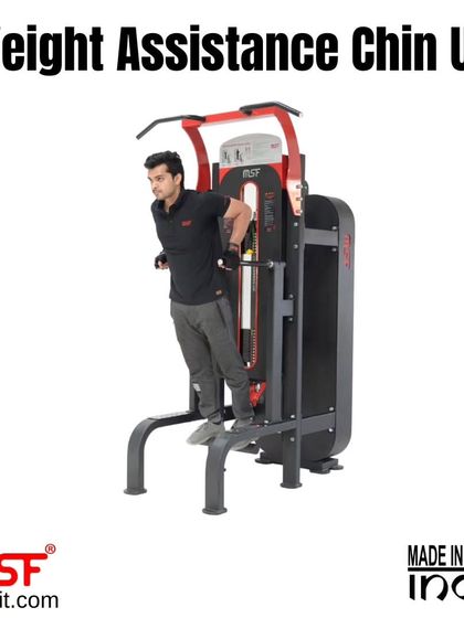 A user performing assisted dips on our versatile chin-up and dip station. The machine provides support to help master the movement with proper form.