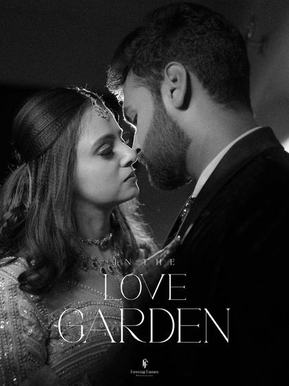 A black and white portrait of the couple about to kiss, titled "In the Love Garden."