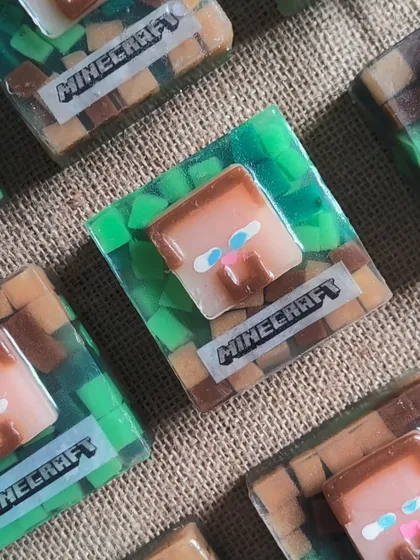 Minecraft-themed goat milk soaps, perfect for fans of the game. These are handmade, paraben-free, and made with pure coconut oil.