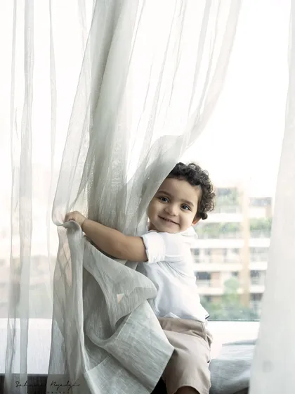 A proud big brother, who I first photographed as a newborn. It's so special to see him with his new baby sibling.