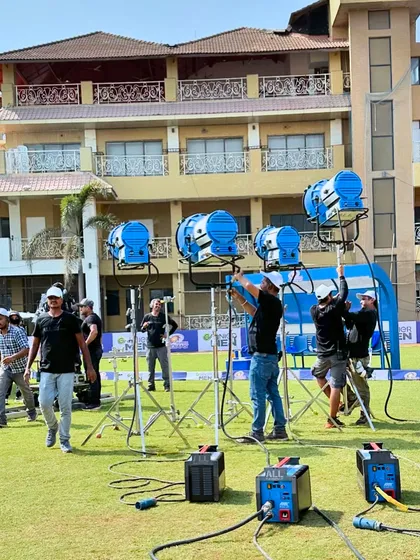 The technical side of an outdoor shoot. Setting up massive lights for the Garnier x Mumbai Indians campaign shows that styling is part of a much larger technical and creative team effort.