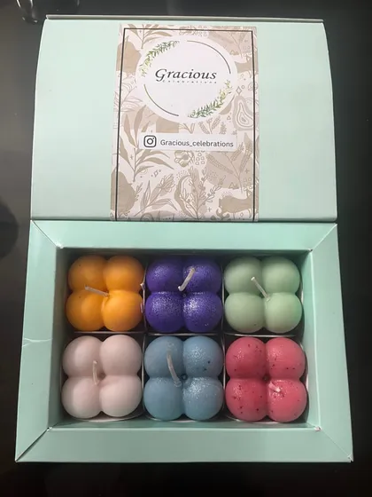 A gift box of 6 assorted bubble candles is a perfect and colorful gift for Diwali. It's an affordable and aesthetic option for gifting to friends and family.