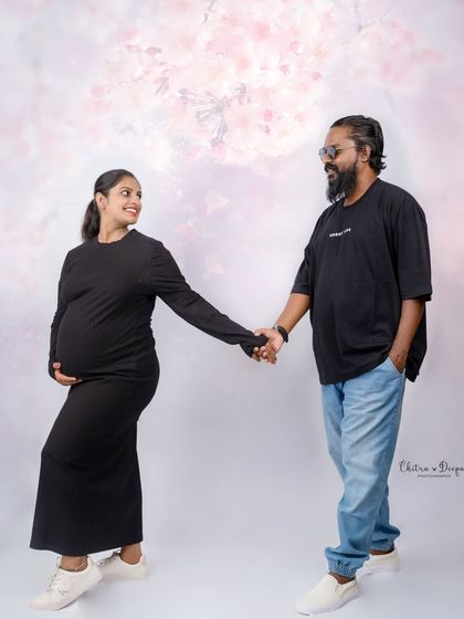 A casual and sweet moment. Even in simple matching black outfits, their connection and happiness shine through.