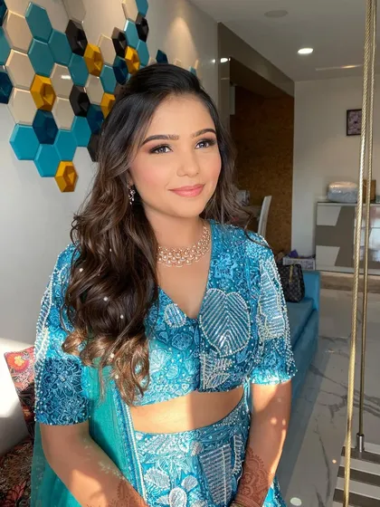 Mansi looking absolutely stunning. The combination of the blue outfit and the soft, glowing makeup is simply perfect.