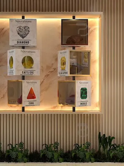This conceptual design showcases an interactive display wall for various gemstones. The modular, back-lit boxes and integrated greenery create a modern, museum-like feel that encourages customer engagement.