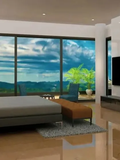A render of a condominium bedroom where the main feature is the view. The design is minimal and clean, with floor-to-ceiling windows that frame the dramatic sky and landscape, making the space feel vast and open.