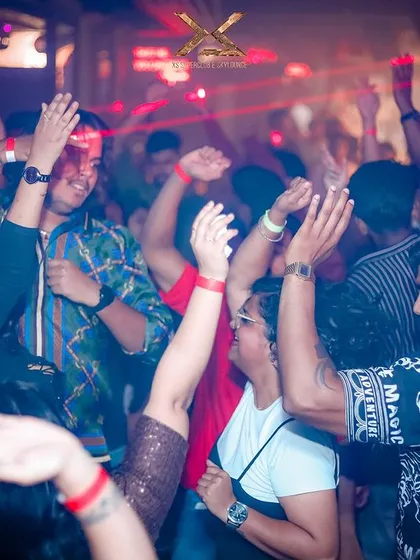 More hands in the air at XS Superclub. The energy was consistent all night long.