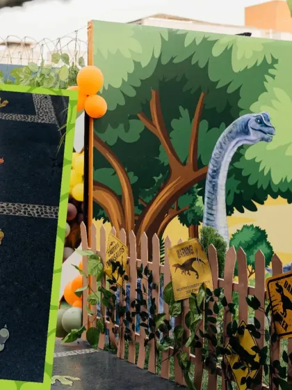We create an adventurous atmosphere with details like dinosaur footprint decals and a rustic fence, making kids feel like they're entering Jurassic Park.
