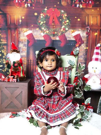 The full Christmas fireplace scene, creating a warm and traditional holiday photo perfect for Christmas cards.