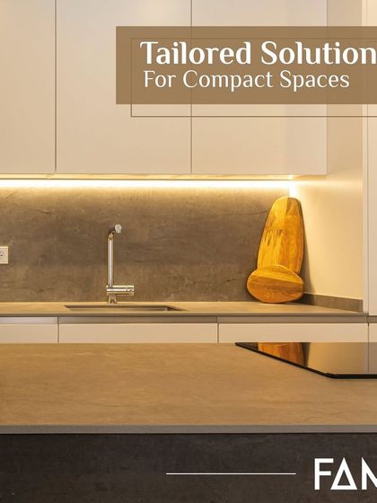 I provide tailored solutions for compact spaces. This minimalist kitchen uses handleless cabinets and under-cabinet lighting to create a clean, uncluttered look that makes the area feel larger and more open.