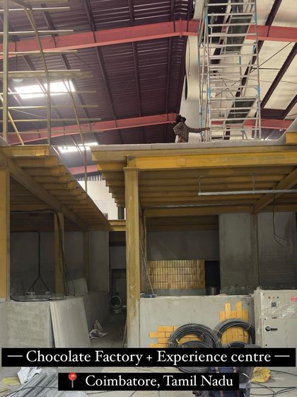 An in-progress shot of a large-scale chocolate factory and experience center we are designing in Coimbatore, Tamil Nadu. This project showcases our ability to manage complex industrial and commercial builds.