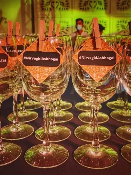 For a touch of glam, I offer custom glittery glass tags with the wedding hashtag. These tags catch the light beautifully and help guests keep track of their drinks during a lively sangeet or reception.