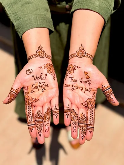 For Gurpriya's engagement, I created this personalized design incorporating the couple's names and the heartfelt quote, "Two hearts, one Guru's path," surrounded by delicate floral details.