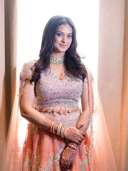 A classic portrait of the bride-to-be, looking poised and elegant in her engagement attire.