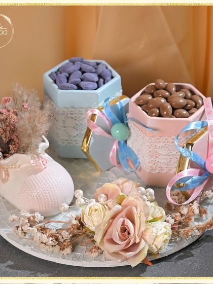 The full gender reveal hamper, showcasing the beautiful balance of pink and blue. The arrangement is perfect for a baby shower or to announce your little one's arrival.