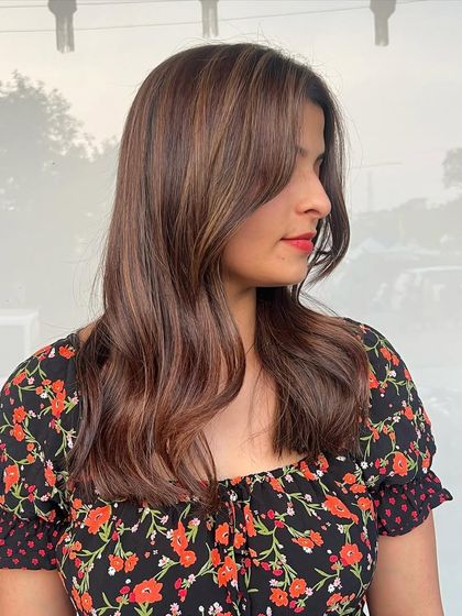 A side view of the no-bleach mocha brown balayage. You can see how the color gently frames her face, adding warmth and dimension.