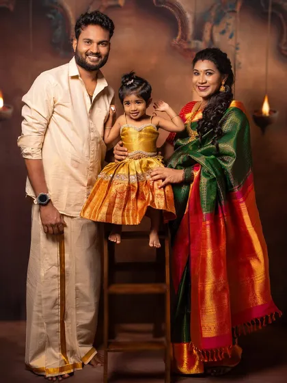 Celebrating heritage is a beautiful part of any family's story. In my studio, I created a classic, traditional setting for this family's maternity portrait, complete with rich silk attire and a warm, timeless backdrop. This is a portrait that will be treasured for generations.