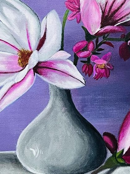 A close up view of the magnolia flowers. You can see the fine brushstrokes and the subtle blending of pinks and whites that give the petals their form.