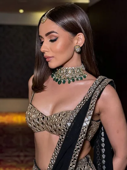 A profile view showing the soft makeup and sleek hair, a perfect combination.