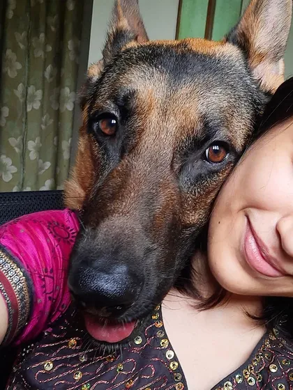 Celebrating Vijayadashami with my best boy. We even manage to twin with our expressions. Life with a dog is full of these silly, happy moments.
