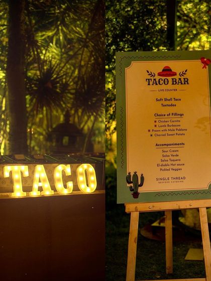 Our taco bar is ready for guests in a lush, green outdoor setting. The combination of the professional menu and the natural backdrop shows our ability to adapt our live stations to any event theme or location.
