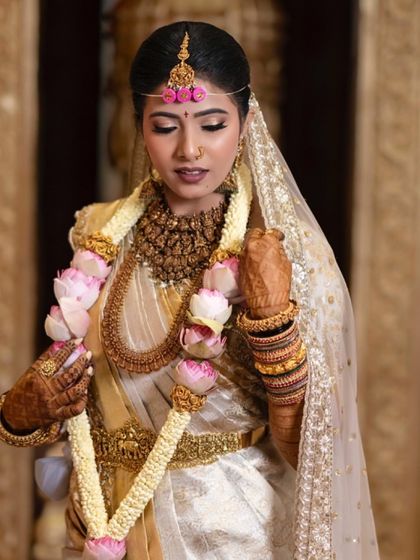 Additional views showcasing the variety and detail of my heirloom bridal sarees. Each image captures a different angle, moment, or detail, from full portraits to close ups of the fabric and embroidery, illustrating the complete story of each bride's custom creation.