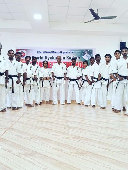 The senior black belt group at a training camp. These advanced sessions are for our most dedicated students to deepen their knowledge.