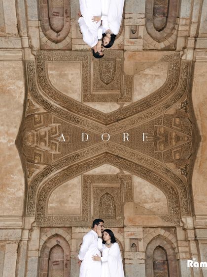 A creative and artistic shot using reflections to mirror the intricate architecture of the ceiling. This technique adds a surreal and grand feeling to this unique couple portrait.