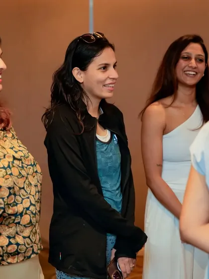 Connection is at the heart of my workshops. Here, I'm sharing a moment with participants after a session, creating a supportive and open environment where everyone feels comfortable on their wellness journey.