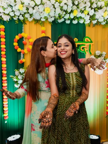 A sweet kiss on the cheek from a friend or family member. These affectionate moments are a joy to photograph.