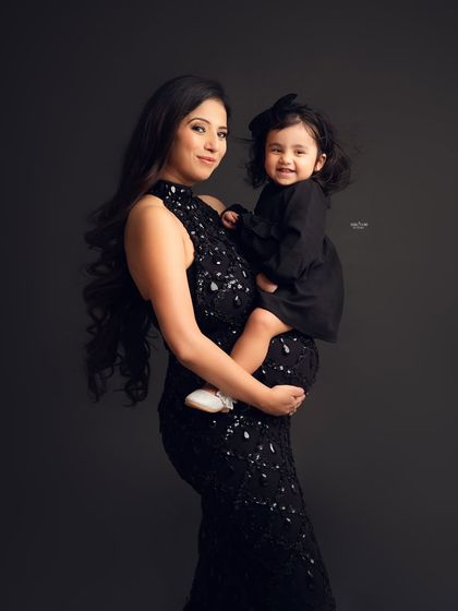 A beautiful mother-daughter portrait during a second maternity shoot. It's so special to capture the family as it grows, with the big sister-to-be sharing the spotlight.