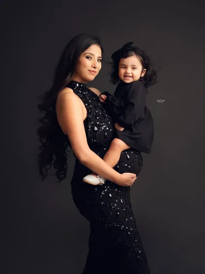 A beautiful mother-daughter portrait during a second maternity shoot. It's so special to capture the family as it grows, with the big sister-to-be sharing the spotlight.
