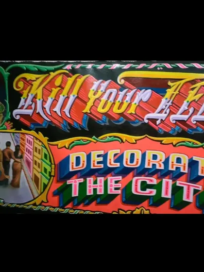 A detail of the "Kill Your Television" sign.