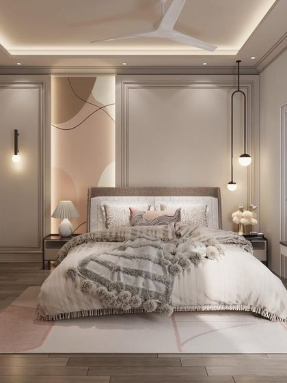 A bedroom that is a study in textures and soft tones. The design features a flowing wallpaper design, a cozy bed, and an arched vanity mirror, creating a serene and feminine space.