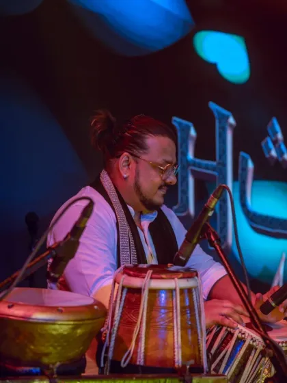 Our percussionist focused on his craft, delivering the complex rhythms of the tabla.