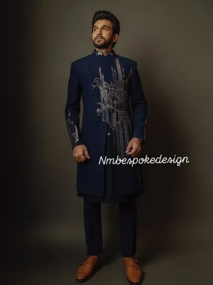 A full view of the architecturally inspired indowestern set, showing its sharp, tailored fit.