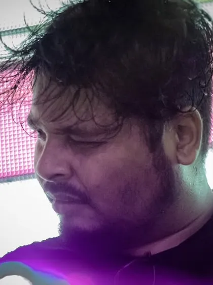 A close-up of our keyboardist, deep in concentration. Every member of the band is locked in, creating a rich, full sound for your venue.