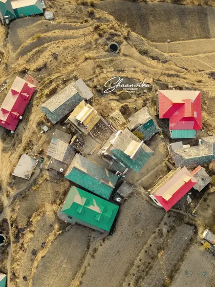 A top down or 'bird's eye' view of the village houses near Dharech. This angle is great for showing patterns and the layout of a location, offering a completely different way to see a place.